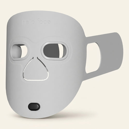 Red light therapy mask - product on cream background